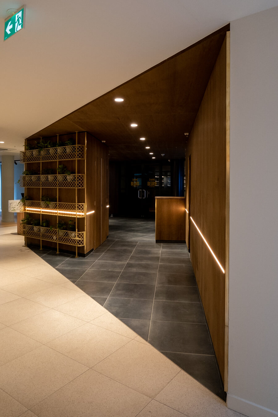 strong perspective of the passage from lighth to dark area in eden hotel amsterdam by apto architects